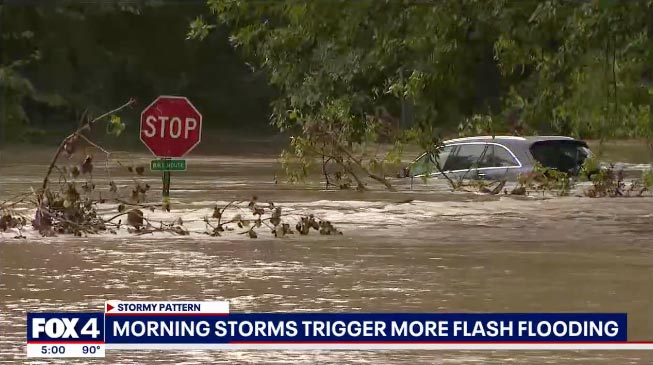 Car stuck in high flood waters in Dallas, Texas