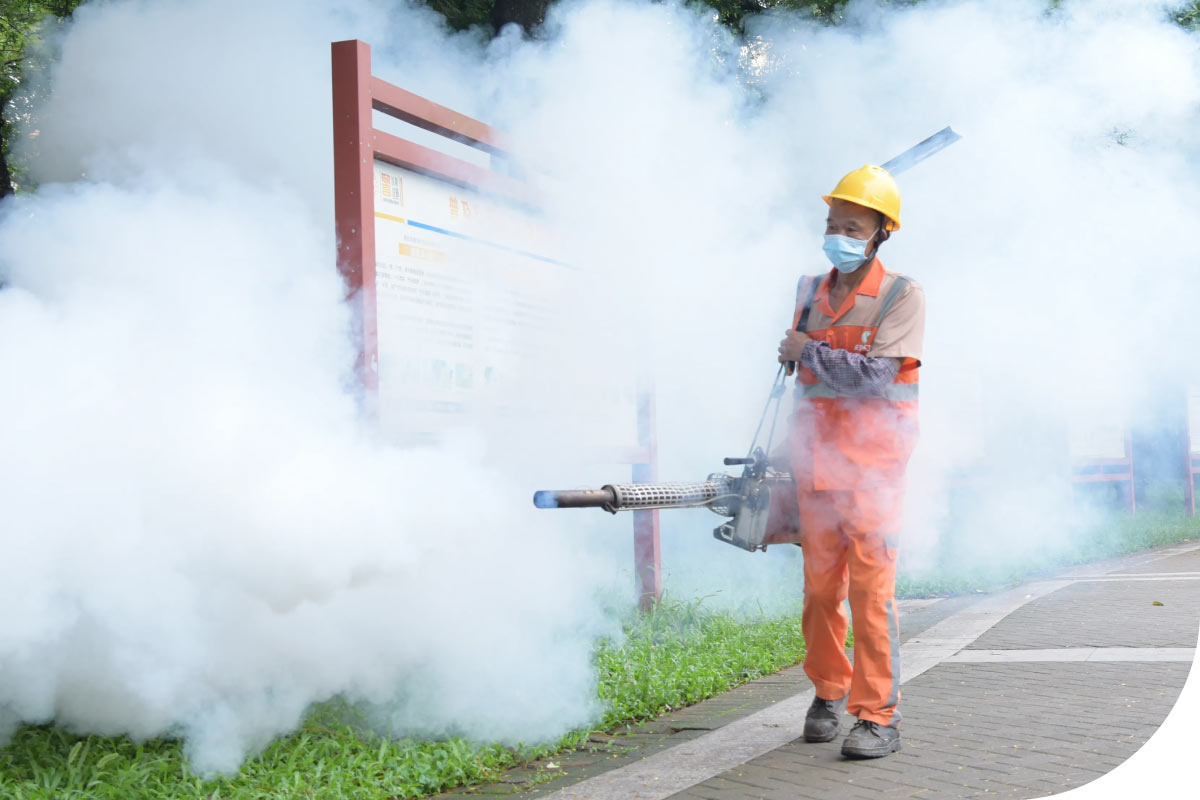 Worker spraying for mosquitoes
