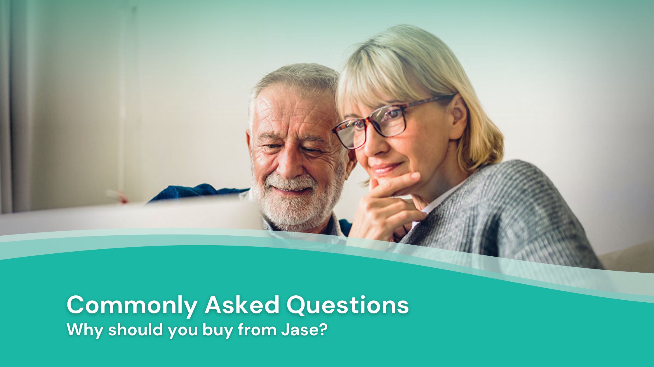 couple looking at computer asking questions